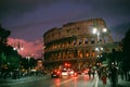 Rome, Italy, January 2007: cityscape of Coliseum in the sunset.