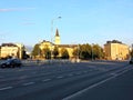 View of church, road in sunset sun in summer Oulu, Finland