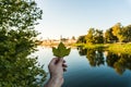 Florence, ITALY - October, 2017: Hands with leaves on Florence. Beautiful cityscape skyline of Firenze, Italy, with the bridges ov Royalty Free Stock Photo