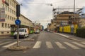 Beautiful cityscape view. Parked cars near old buildings. Building under reconstruction.