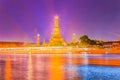 Beautiful cityscape view of Wat Arun Rajwararam temple with light trail from the Chao Phraya river cruises and light shows Royalty Free Stock Photo