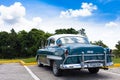 A beautiful classic car in cuba under blue sky Royalty Free Stock Photo