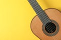 Beautiful classic guitar on yellow background Royalty Free Stock Photo