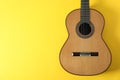 Beautiful classic guitar on yellow background Royalty Free Stock Photo