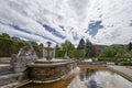 Classic public city park with a fountain, flowers and statues in the German city of Baden Baden, Europe Royalty Free Stock Photo