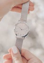 Beautiful classic white watch in woman hands