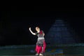 Beautiful Classical Odissi or orissi dancer performing on stage at Konark Temple, Odisha, India.