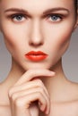 Beautiful clean model face with bright red lips make-up Royalty Free Stock Photo