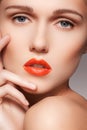 Beautiful clean model face with bright red lips make-up Royalty Free Stock Photo