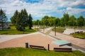 Beautiful clean park with Christmas trees and bouquets of flowers