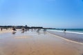 Beautiful clean Porto sandy matosinhos beach with people surfing in surf school