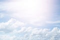 Beautiful clear blue sky background with plain large white cloud on morning time rays sunlight.