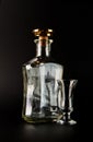 Beautiful Clear glass bottle isolated on black background Royalty Free Stock Photo