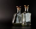 Beautiful Clear glass bottle isolated on black background Royalty Free Stock Photo