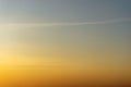 Beautiful clear, morning sky at sunrise, natural background. Soft gradient from orange to blue.