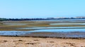 Troon Shore, South Ayrshire, Scotland, looking south towards Troon Marinae Island of Arranarassie