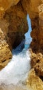 Beautiful cliffs in turquoise Atlantic ocean near beach Praia Dona Ana, Lagos, Portugal Royalty Free Stock Photo