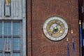 Beautiful clock on the external wall of the Oslo town hall,  Norway Royalty Free Stock Photo