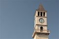 Tirana, Albania, August 2013. Beautiful clock tower in the center of the capital of the country as the basis of the background.