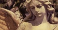 Beautiful close up af a face angel stone sculpture with a sweet Royalty Free Stock Photo