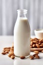 Beautiful close-up of almond milk on a white background, made with generative AI
