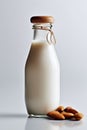Beautiful close-up of almond milk on a white background, made with generative AI