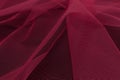 Beautiful close up of red tulle fabric with textile texture background Royalty Free Stock Photo