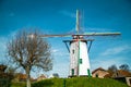 Traditional old windmill against blue sky Royalty Free Stock Photo