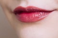 Beautiful closeup female plump lips with bright color makeup