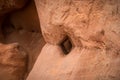 A beautiful closeup of a sandstone cliffs in Latvia. Close pattern of a sand formations. Sandstone caves at the seaside.