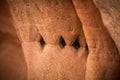 A beautiful closeup of a sandstone cliffs in Latvia. Close pattern of a sand formations. Sandstone caves at the seaside.