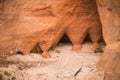 A beautiful closeup of a sandstone cliffs in Latvia. Close pattern of a sand formations. Sandstone caves at the seaside.