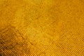 Beautiful closeup textures abstract color dark yellow and gold tiles granite and gold glass pattern wall and background and art