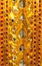 Beautiful closeup textures abstract tiles and gold and colorful glass wall background and art Royalty Free Stock Photo