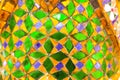 Beautiful closeup textures abstract tiles and gold and colorful glass wall background and art Royalty Free Stock Photo