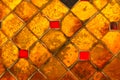 Beautiful closeup textures abstract tiles and gold and colorful glass wall background and art