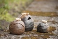 Beautiful closeup of unique handmade three pots in summer Royalty Free Stock Photo