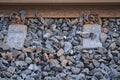 Closeup view of railway track components, Blackrock train station, Dublin, Ireland. Sleeper, weld, rail, components Royalty Free Stock Photo