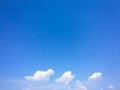 White clouds disappear in the hot sun on blue sky. Clouds on blue sky background. Weather nature blue sky with white cloud and sun Royalty Free Stock Photo