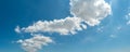 Beautiful clouds on blue sky  background, wide panorama of high resolution Royalty Free Stock Photo
