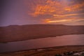 Beautiful clouds flying over the lake near mountains. Evening time shot over the clouds. Baku, Azerbaijan Royalty Free Stock Photo