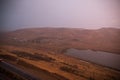 Beautiful clouds flying over the lake near mountains. Evening time shot over the clouds. Baku, Azerbaijan Royalty Free Stock Photo