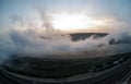 Beautiful clouds flying over the lake near mountains. Evening time shot over the clouds. Baku, Azerbaijan Royalty Free Stock Photo