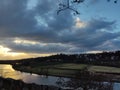 beautiful clouds in the form of a paw over the narrow sources of the river