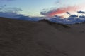 Beautiful clouds over the dunes at sunset Royalty Free Stock Photo