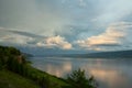 Beautiful clouds over a large river. Royalty Free Stock Photo