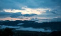 Dramatic landscape caribbean mountain image with storm clouds at dawn sunset. Royalty Free Stock Photo