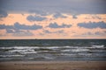 Beautiful clouds and sunset over seaside.