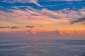 Beautiful cloudscape and dramatic sunset over mountain and sea Royalty Free Stock Photo