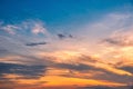 Beautiful cloudscape and dramatic sunset over mountain and sea Royalty Free Stock Photo